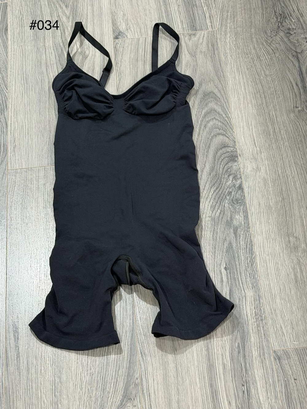 SKIMS Black One-Piece Bodysuit with Built-In Cups